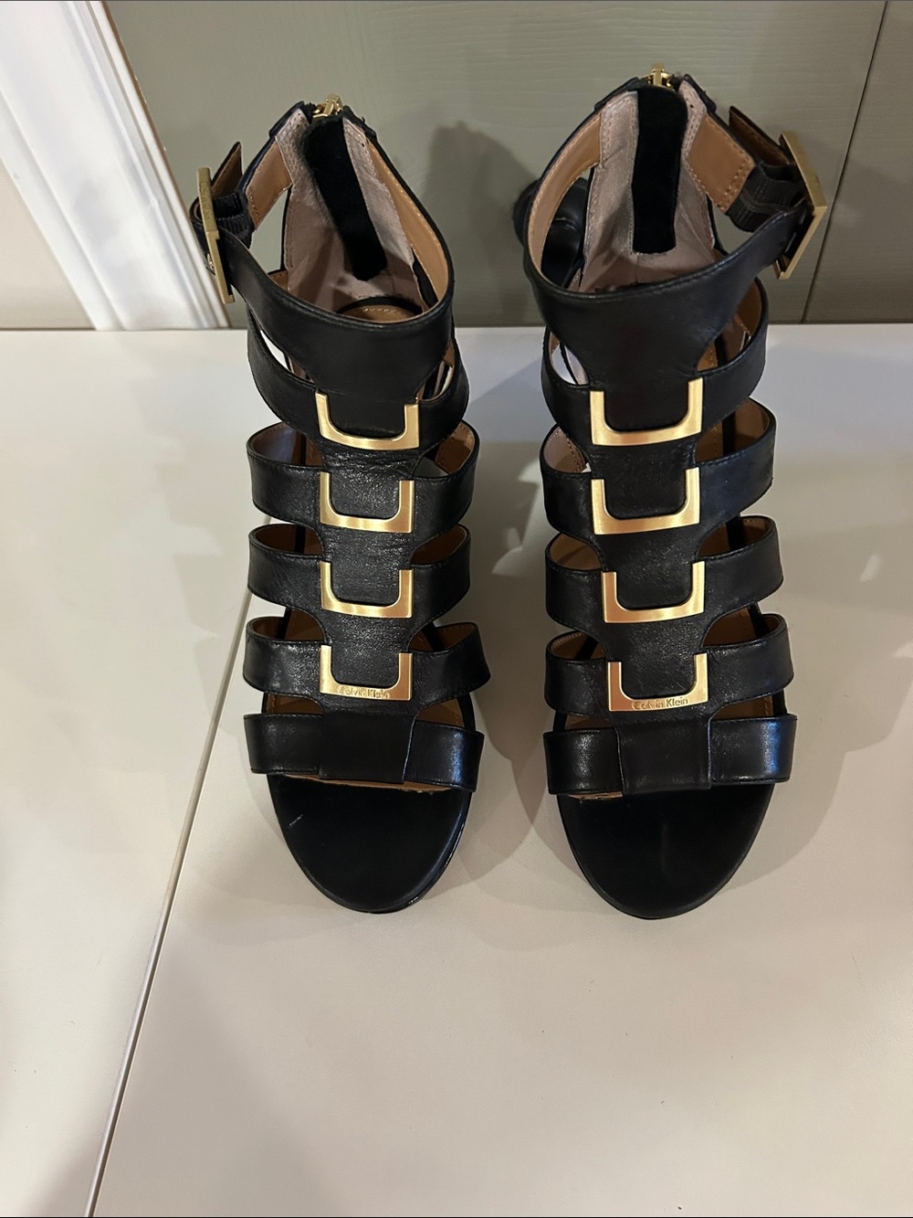 Calvin Klein Black Strappy Leather-Upper Gladiator Sandals with Gold Accents